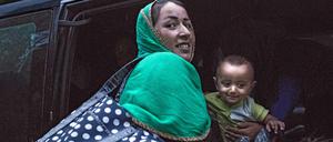 Eine syrische Mutter mit ihrem Baby bei ihrer Ankunft in Deutschland.