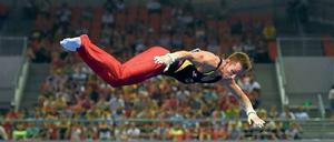 Volles Risiko. Andreas Bretschneider hat sich nicht beirren lassen – auch wenn die Turnübung, die er als Erster schaffen wollte, eigentlich als unmöglich galt.