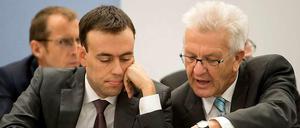 Stellt sich gegen Schäuble: Der Stuttgarter Finanzminister Nils Schmid, mit Ministerpräsident Winfried Kretschmann.