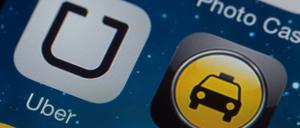Umstritten. Der US-Fahrdienst Uber hat vor allem die Taxiunternehmen gegen sich aufgebracht.