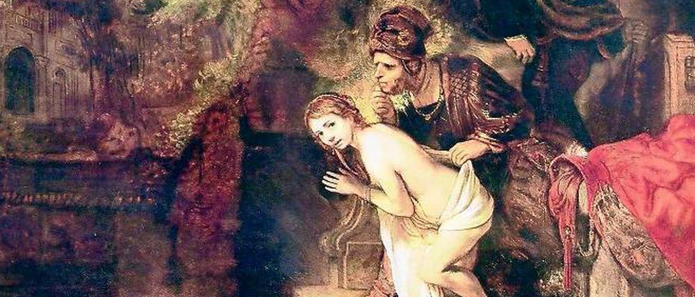 Eine Frau will zum Baden ins Wasser steigen, ein Mann nähert sich ihr von hinten und will ihr ein Hüfttuch wegziehen.