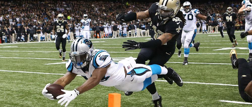 Leidensbrüder unter sich. Die New Orleans Saints (in schwarz) und die Carolina Panthers gehören zur schwächsten Division der NFL.