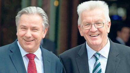 Geber und Nehmer. Winfried Kretschmann (rechts) ist seit 2011 Ministerpräsident von Baden-Württemberg. 