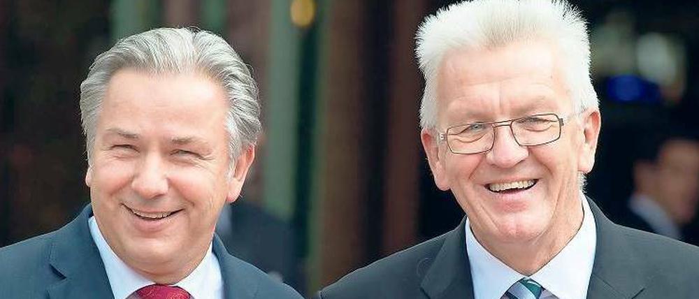 Geber und Nehmer. Winfried Kretschmann (rechts) ist seit 2011 Ministerpräsident von Baden-Württemberg. 
