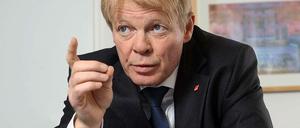 DGB-Chef Reiner Hoffmann fordert die Regierung auf, die Leiharbeit zu begrenzen.
