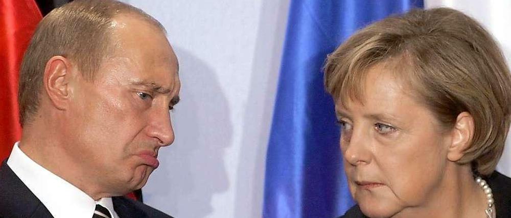 Russlands Präsident Wladimir Putin und Bundeskanzlerin Angela Merkel
