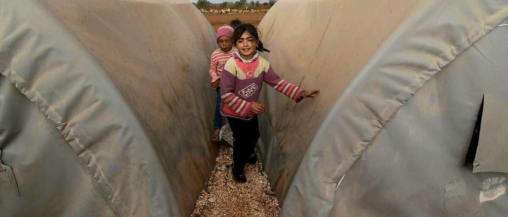 Auf Lebensmittel angewiesen. Syrische Familien in den Flüchtlingslagern.