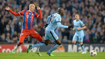 Eliaquim Mangala (r.) kann Arjen Robben in dieser Szene überraschen.