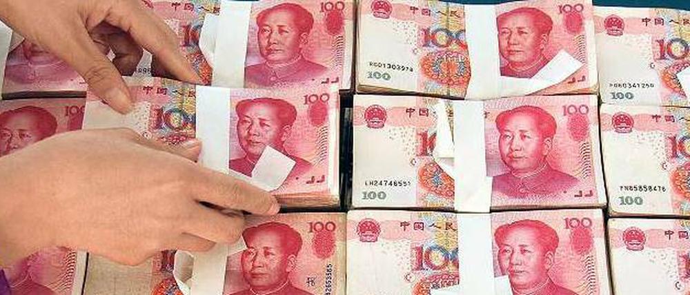 China tastet sich vor. Die Landeswährung Renminbi kann jetzt auch über die Drehscheibe Frankfurt am Main gehandelt werden. 