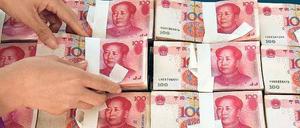 China tastet sich vor. Die Landeswährung Renminbi kann jetzt auch über die Drehscheibe Frankfurt am Main gehandelt werden.