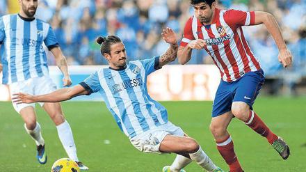 Atleticos Erfolgsgaranten. Stürmer Diego Costa zählt zu den erfolgreichsten Torjägern in der Primera Division. Unter Trainer Diego Simeone (rechts) spielt er groß auf. 