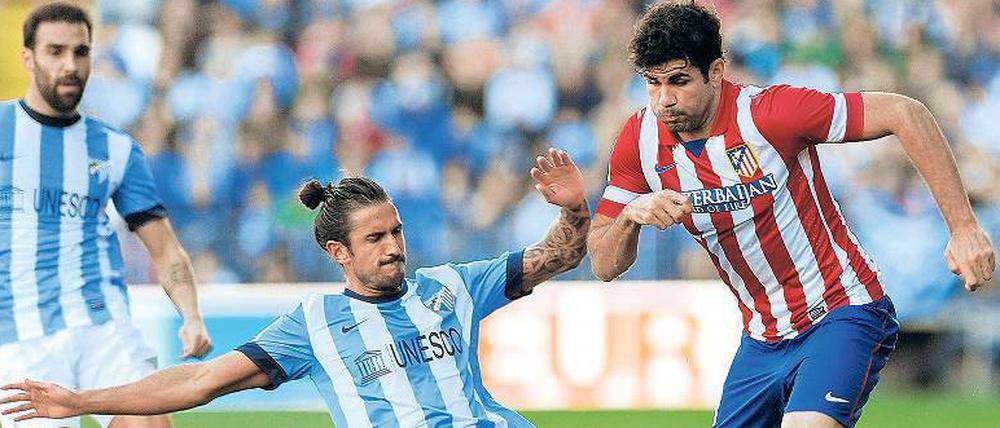 Atleticos Erfolgsgaranten. Stürmer Diego Costa zählt zu den erfolgreichsten Torjägern in der Primera Division. Unter Trainer Diego Simeone (rechts) spielt er groß auf. 