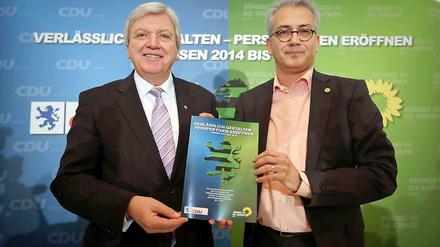 Neues Duo in Hessen: Ministerpräsident Volker Bouffier (CDU, links), und Grünen-Chef Tarek Al-Wazir, der Wirtschaftsminister werden soll.
