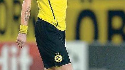 Fassungslos im Regen. Kevin Großkreutz bei der Verarbeitung des 0:1. Foto: AFP