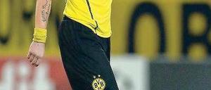 Fassungslos im Regen. Kevin Großkreutz bei der Verarbeitung des 0:1. Foto: AFP