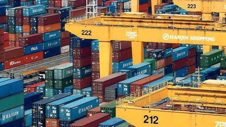 Massenweise. Der Erfolg auf dem Weltmarkt bringt den Deutschen Kritik ein – doch sie argumentieren, dass das Exportplus auch den Nachbarn hilft. Foto: Reuters