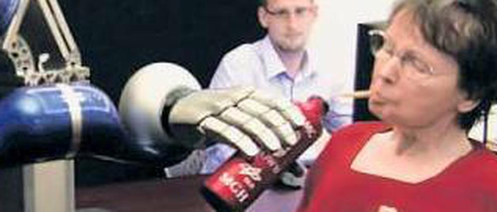 Bewegend. Gelähmte können mit Braingate einen Roboterarm steuern. 