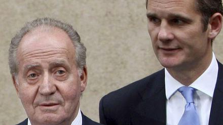 Der spanische König Juan Carlos (links) mit seiner Tochter Infantin Cristina und dem Schwiegersohn Iñaki Urdangarin.