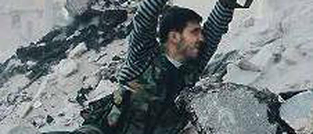 Ein Kämpfer der „Freien Syrischen Armee“ in der Stadt Aleppo. Foto: Reuters