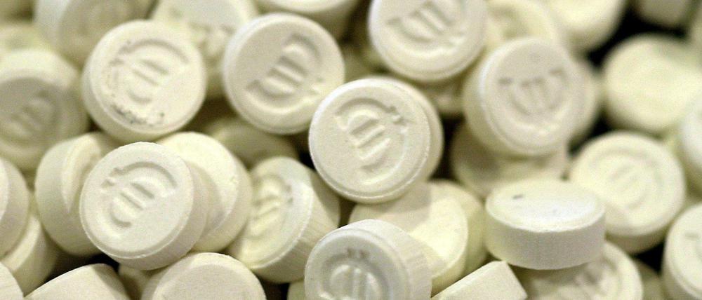 Ecstasy-Pillen mit Euro-Zeichen.