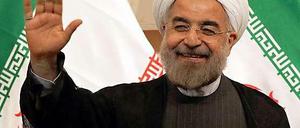 Verbirgt sein Lächeln mehr, als es offenbart? Irans Präsident Hassan Rohani.