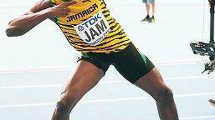 Mit Pfeil und Bolt. Die Inszenierung des jamaikanischen Weltrekordlers. Foto: dpa