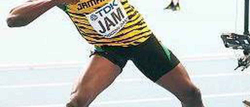 Mit Pfeil und Bolt. Die Inszenierung des jamaikanischen Weltrekordlers. Foto: dpa