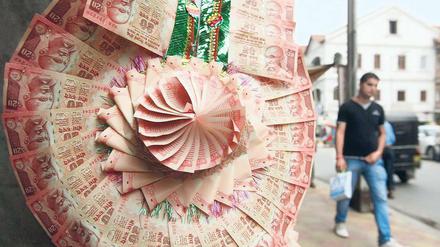 Gestützt. Die indische Notenbank interventiert am Devisenmarkt, um den Verfall der Rupie zu bremsen. 