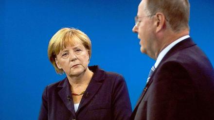 Kanzlerin Merkel (CDU) und Herausforderer Steinbrück (SPD).
