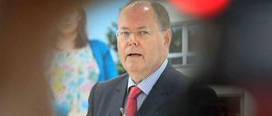 Hat Peer Steinbrück sich mit seiner Bemerkung über Merkels DDR-Sozialisation vergaloppiert?