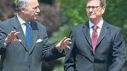 Im Garten der Villa Borsig in Berlin, wo Außenminister Guido Westerwelle (rechts) seinen französischen Amtskollegen Laurent Fabius zum Antrittsbesuch empfing, ging es um Syrien.