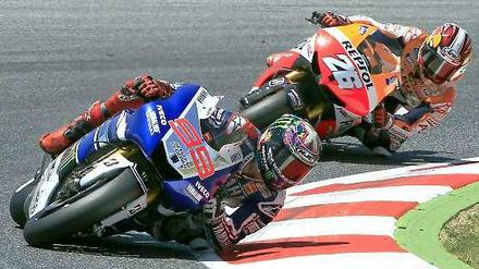 Jorge Lorenzo (vorn) und Dani Pedrosa (hier während des Grand Prix in Barcelona) fuhren am Wochenende trotz Verletzungen am Schlüsselbein.