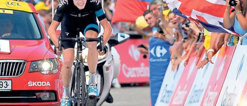 Die letzten Meter zum Gelben Trikot. Christopher Froome gewinnt die achte Etappe und setzt sich an die Spitze des Gesamtklassements. Foto: dpa