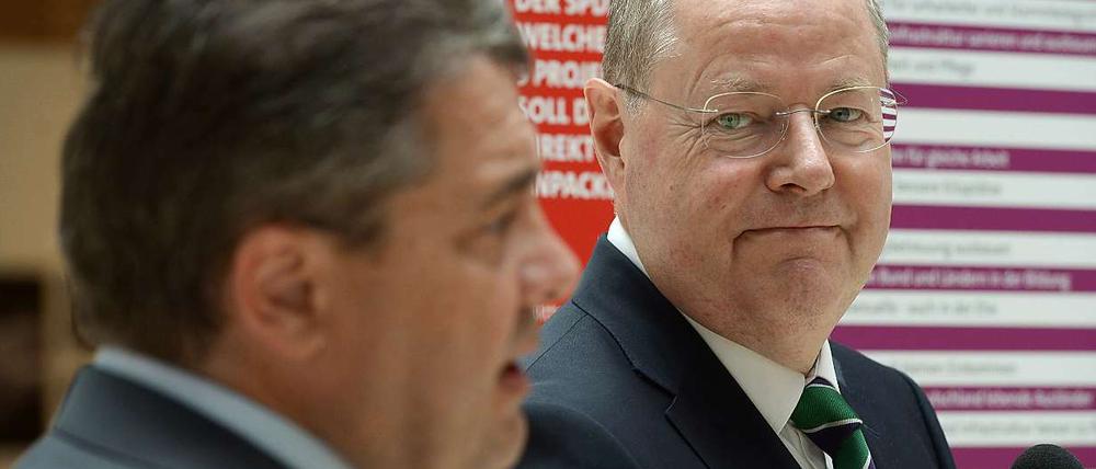 Peer Steinbrück und Sigmar Gabriel wollen mit einem Harmonie-Signal die SPD-Basis beruhigen.