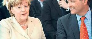 Stolz wie Eric. IHK-Chef Schweitzer freut sich über den Besuch der Kanzlerin. 