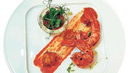 Indisches Entré. Tandoori-Garnelen, Zwiebelpakora.