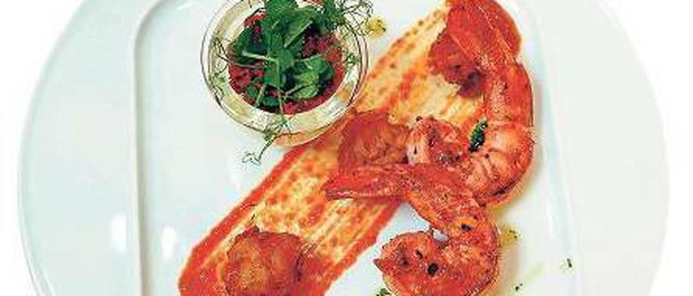 Indisches Entré. Tandoori-Garnelen, Zwiebelpakora.