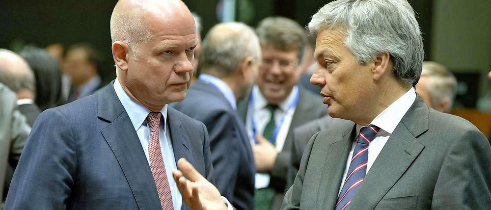 Schwierige Verhandlungen. Der britische Außenminister William Hague (links) und sein belgischer Amtskollege Didier Reynders am Montag in Brüssel.