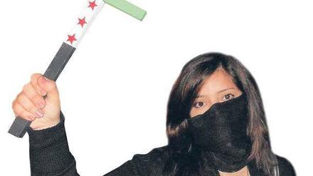 Komplizierte Symbolik: In den syrischen Farben bemalte Kreuze als Protest gegen Assad.