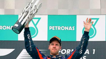 Wieder ganz vorne: Sebastian Vettel jubelt in Sepang über den ersten Saisonsieg.