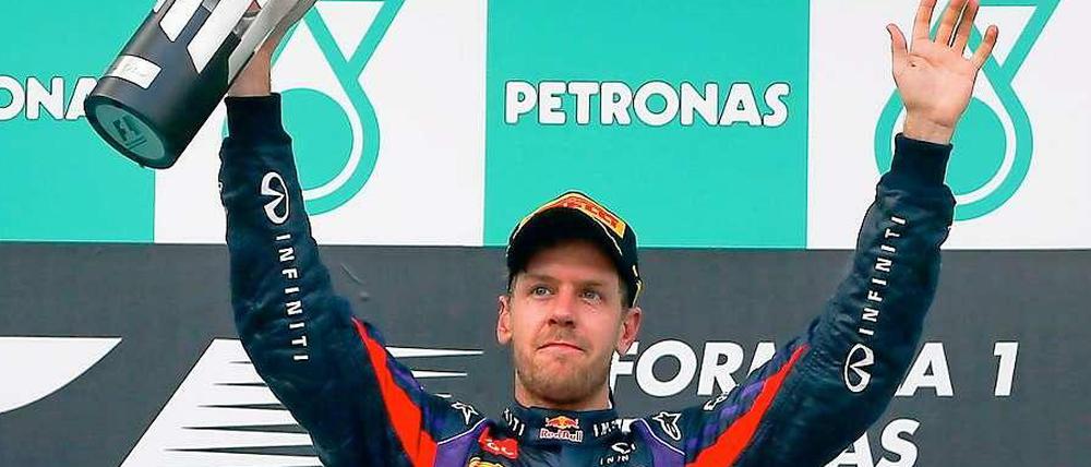 Wieder ganz vorne: Sebastian Vettel jubelt in Sepang über den ersten Saisonsieg.