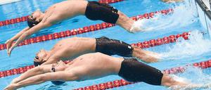 Ballett der perfekten Körper. Start zum 200-Rückenschwimm-Finale der Männer bei den Olympischen Spielen in London.
