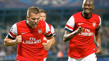 Bescheiden auf dem Flügel. Lukas Podolski fühlt sich wohl in London, obwohl ihn Arsenals Trainer Arsène Wenger nur auf der linken Außenbahn und nicht als zentralen Angreifer einsetzt.