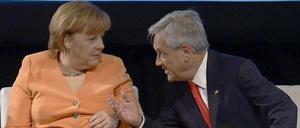 Bundeskanzlerin Merkel und der chilenische Präsident Sebastian Pinera haben sich beim EU-Lateinamerika-Gipfel offenbar gut verstanden - und ein Rohstoffabkommen unterzeichnet.