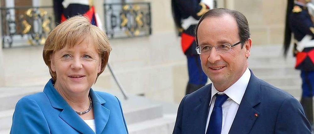 Kanzlerin Merkel und Staatschef Hollande vertreten unterschiedliche politische Lager. Nachdem sie bei zwei EU-Gipfeln heftig aneinandergerieten, suchen sie wieder den Konsens.