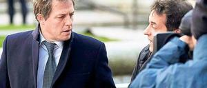 Presse im Visier. Auch Schauspieler Hugh Grant zeigte sich gestern interessiert am Leveson-Report. Foto: dpa