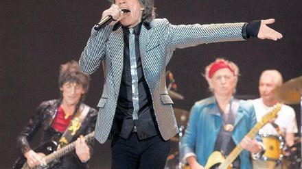 Hit-Parade. Mick Jagger mit Ron Wood (l.), Keith Richards und Charlie Watts (r.) am Montagabend in London.