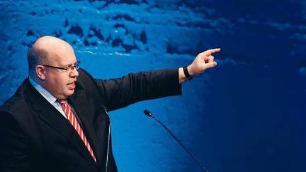 Da geht’s lang. Umweltminister Peter Altmaier beim BDI. Vorher hatte Wirtschaftsminister Philipp Rösler schon in die andere Richtung gezeigt. 