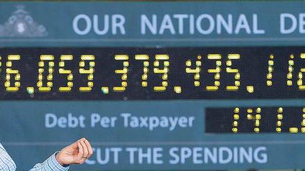 Mit der riesigen Staatsschuld machten die Republikaner (hier Vizepräsidentschaftskandidat Paul Ryan) im Wahlkampf Stimmung gegen Präsident Barack Obama und die Demokraten. 