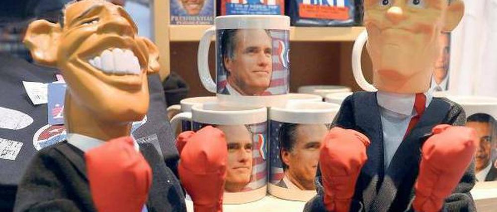 Bereit zum Kampf. Das Rennen um die Präsidentschaft ist nach der ersten Fernsehdebatte enger geworden, darauf reagieren auch die Souvenirshops in den USA.